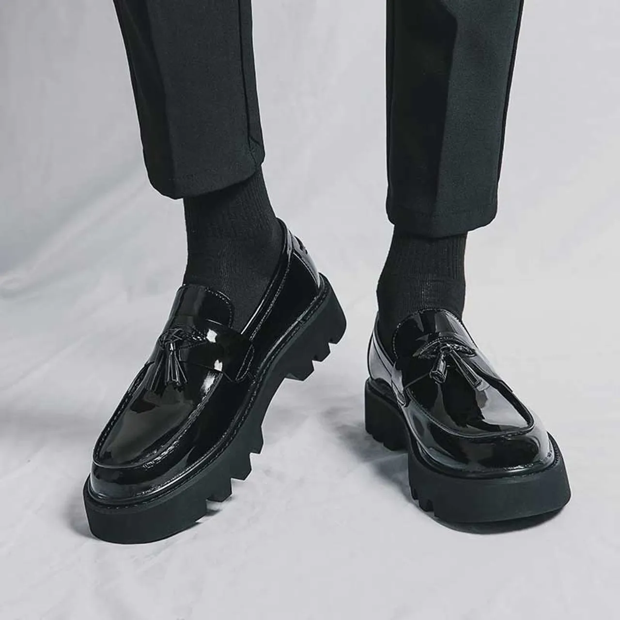 Black patent tassel on top penny slip on dress shoe