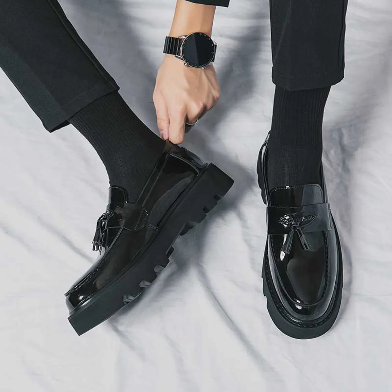 Black patent tassel on top penny slip on dress shoe