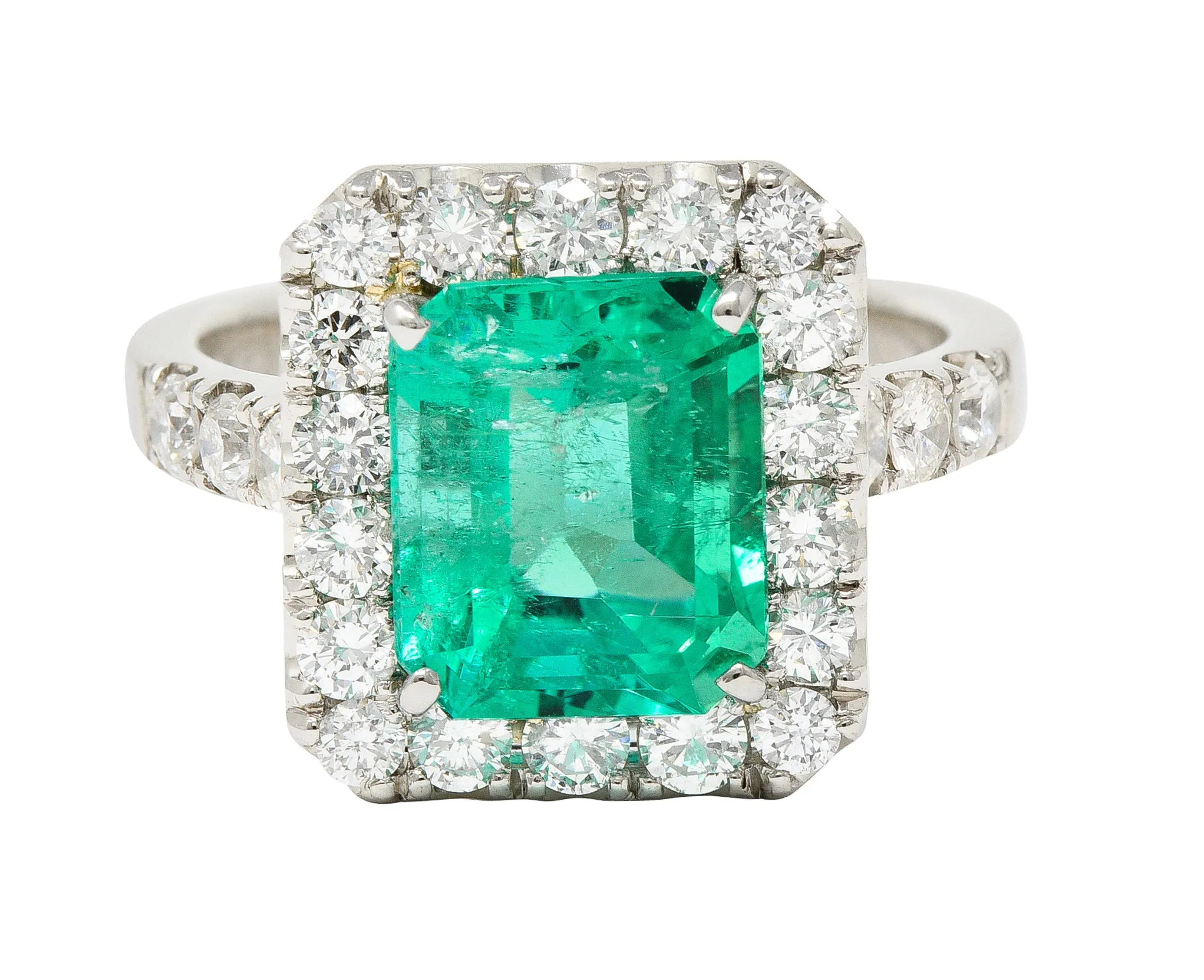 Contemporary 3.50 CTW Colombian Emerald Diamond Platinum Halo Ring GIA