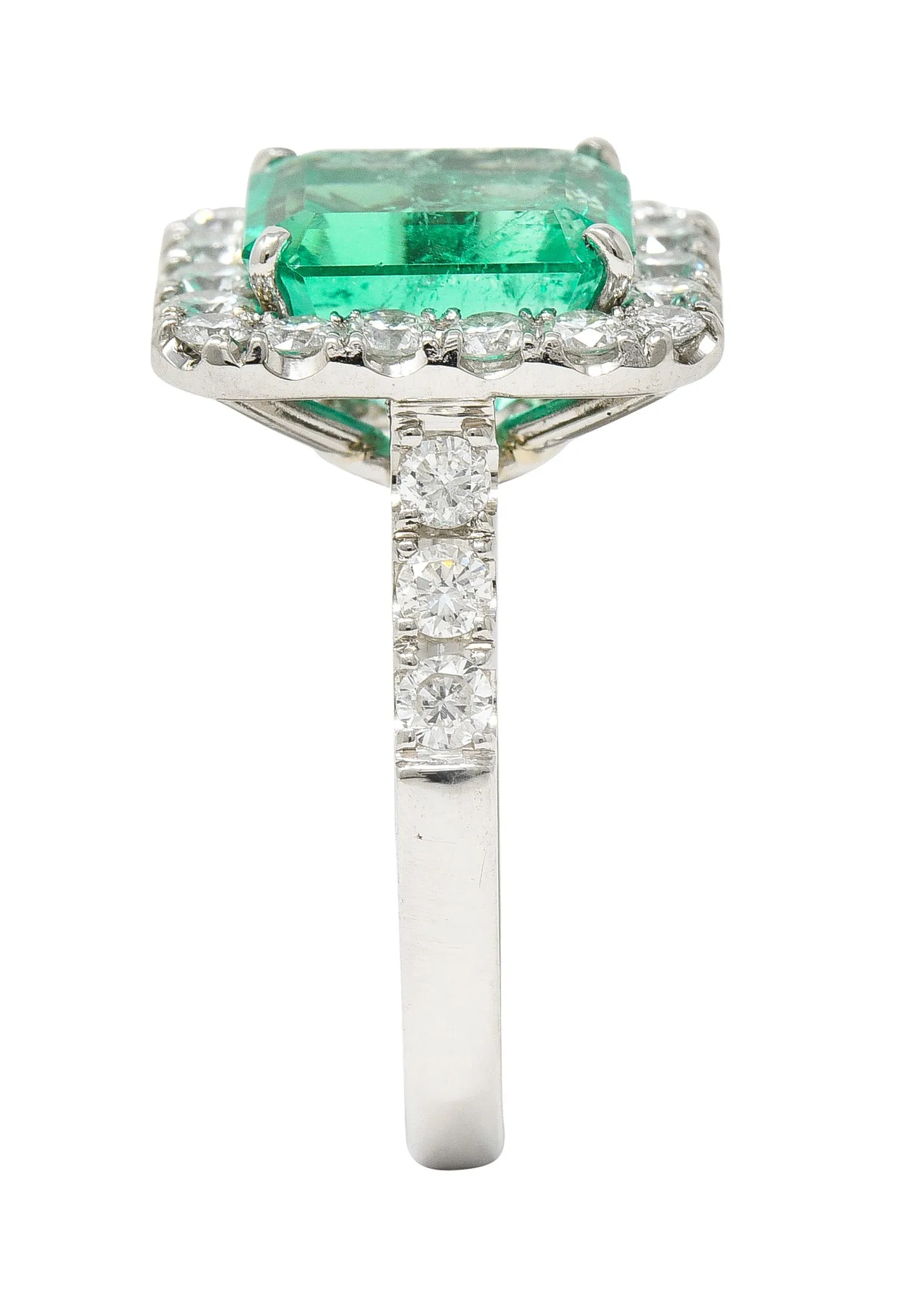 Contemporary 3.50 CTW Colombian Emerald Diamond Platinum Halo Ring GIA