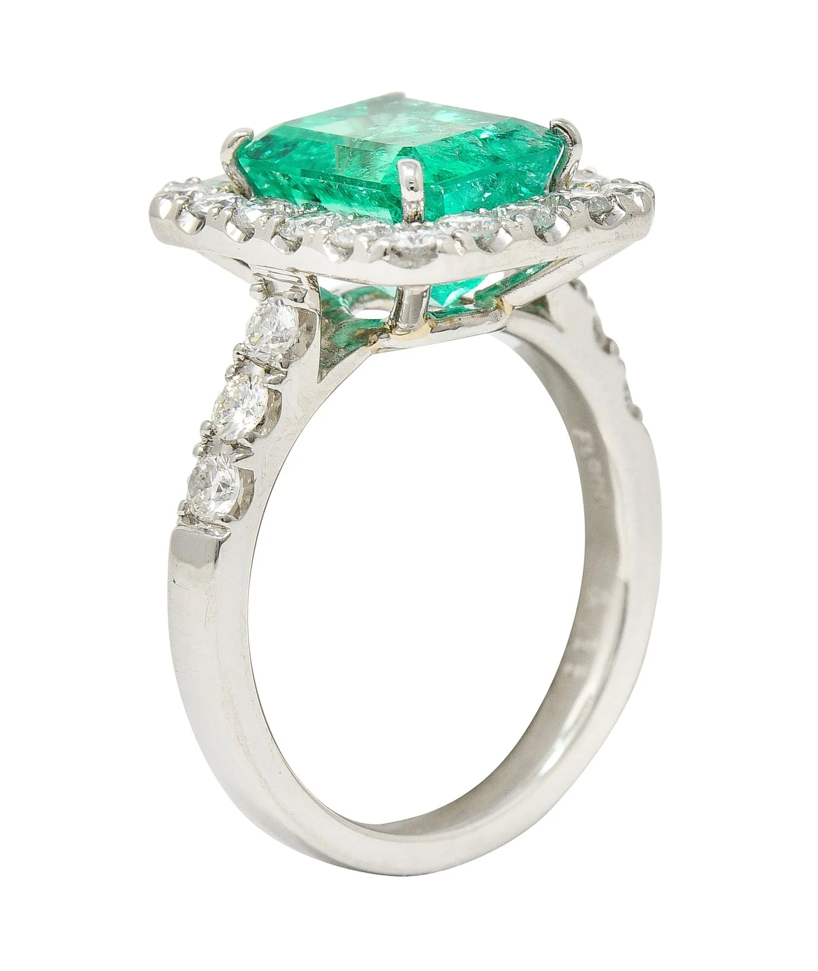 Contemporary 3.50 CTW Colombian Emerald Diamond Platinum Halo Ring GIA