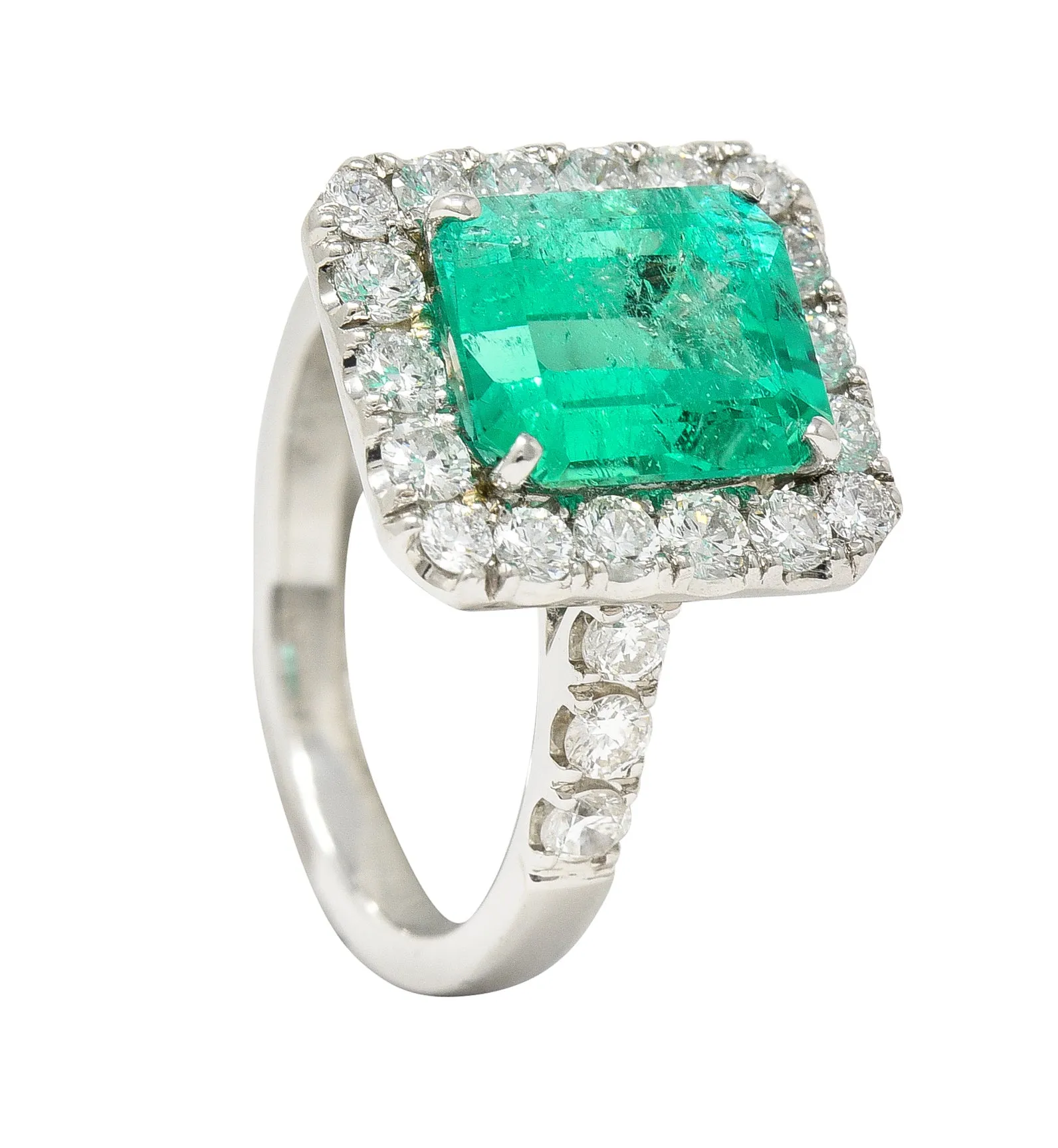 Contemporary 3.50 CTW Colombian Emerald Diamond Platinum Halo Ring GIA