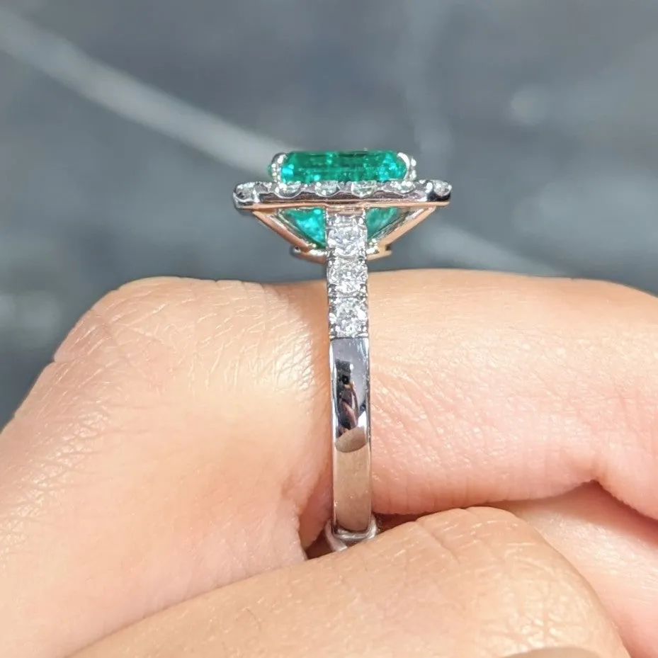 Contemporary 3.50 CTW Colombian Emerald Diamond Platinum Halo Ring GIA