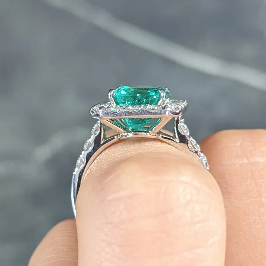 Contemporary 3.50 CTW Colombian Emerald Diamond Platinum Halo Ring GIA