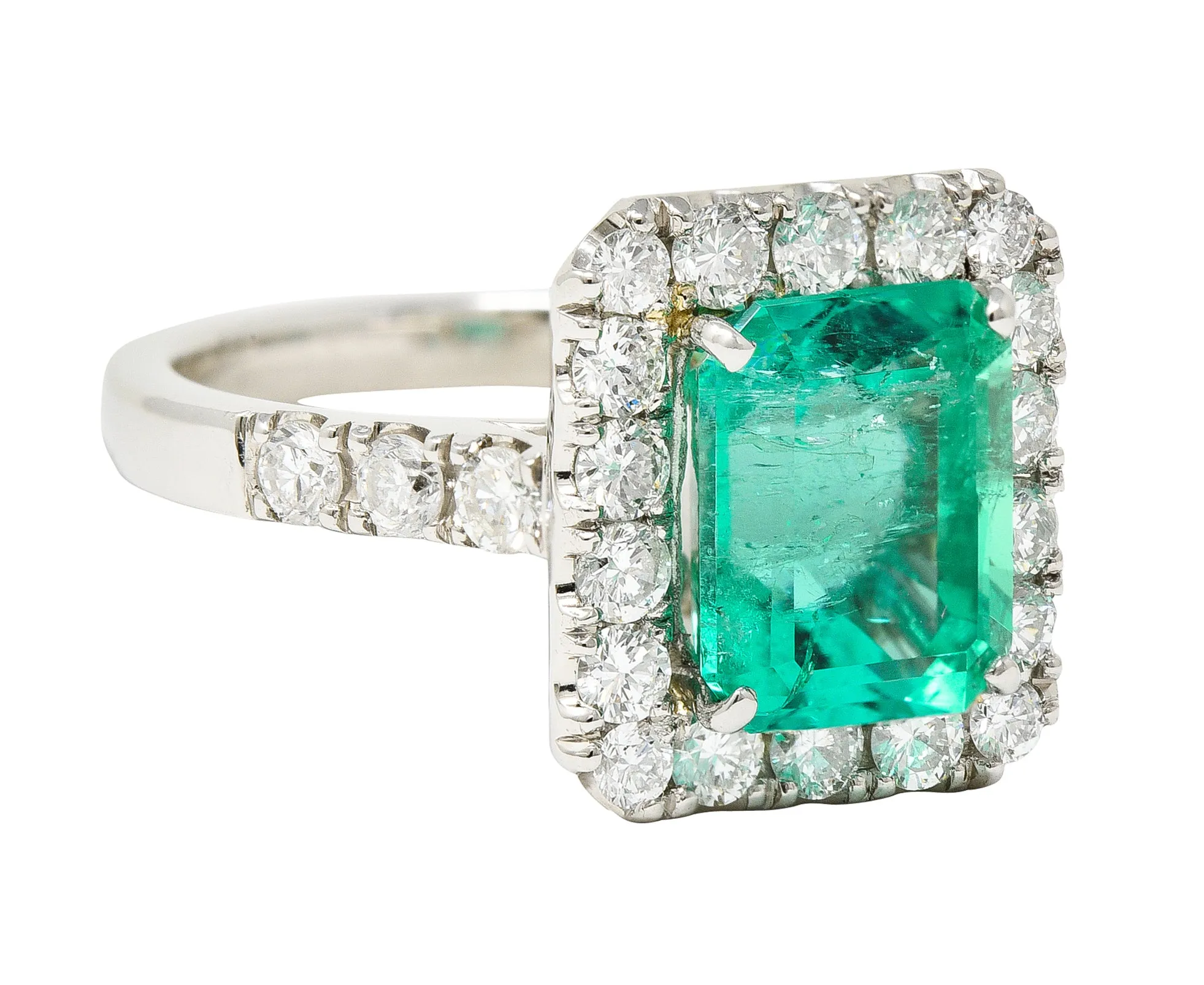 Contemporary 3.50 CTW Colombian Emerald Diamond Platinum Halo Ring GIA