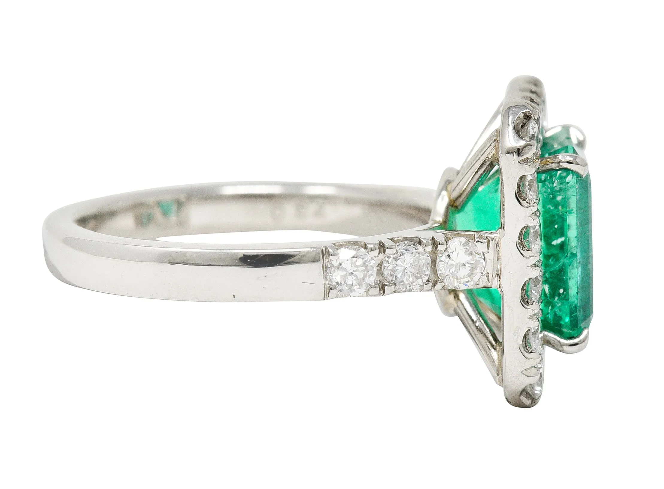 Contemporary 3.50 CTW Colombian Emerald Diamond Platinum Halo Ring GIA