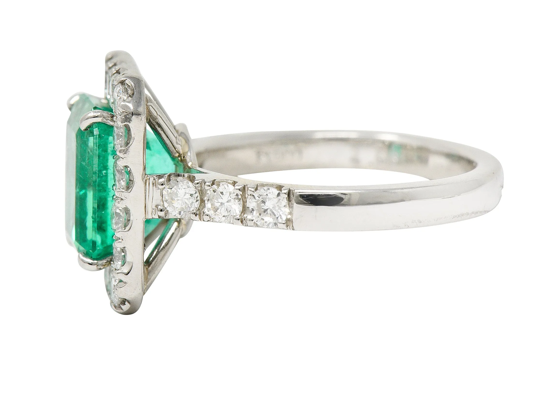 Contemporary 3.50 CTW Colombian Emerald Diamond Platinum Halo Ring GIA