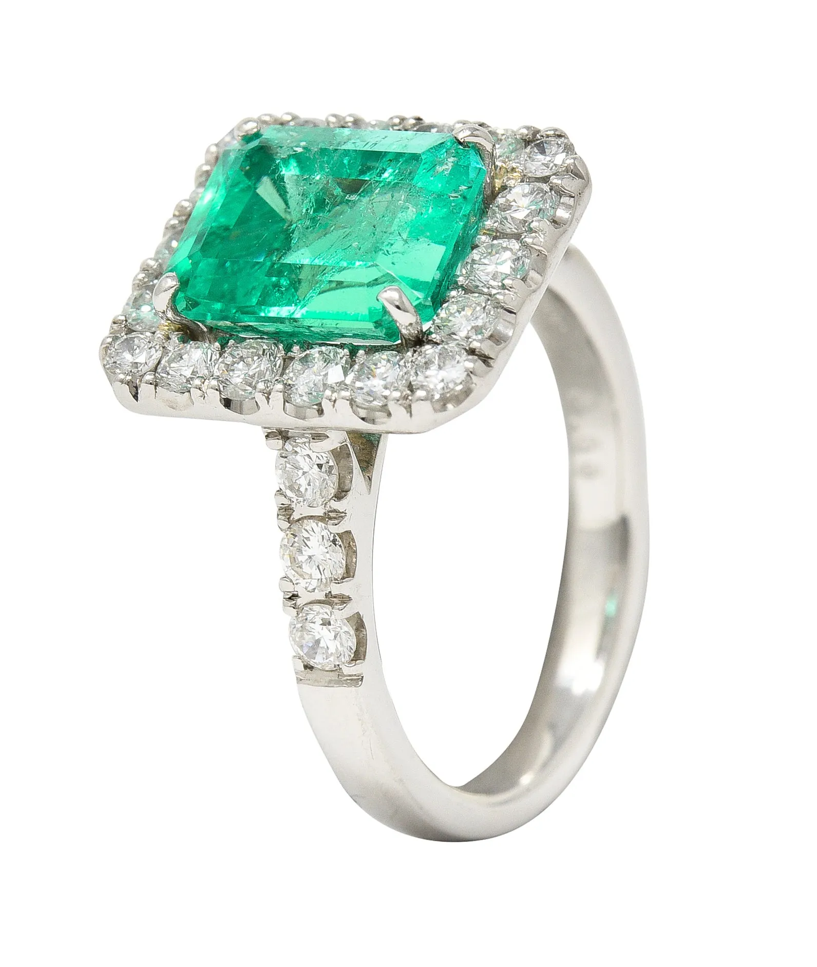 Contemporary 3.50 CTW Colombian Emerald Diamond Platinum Halo Ring GIA