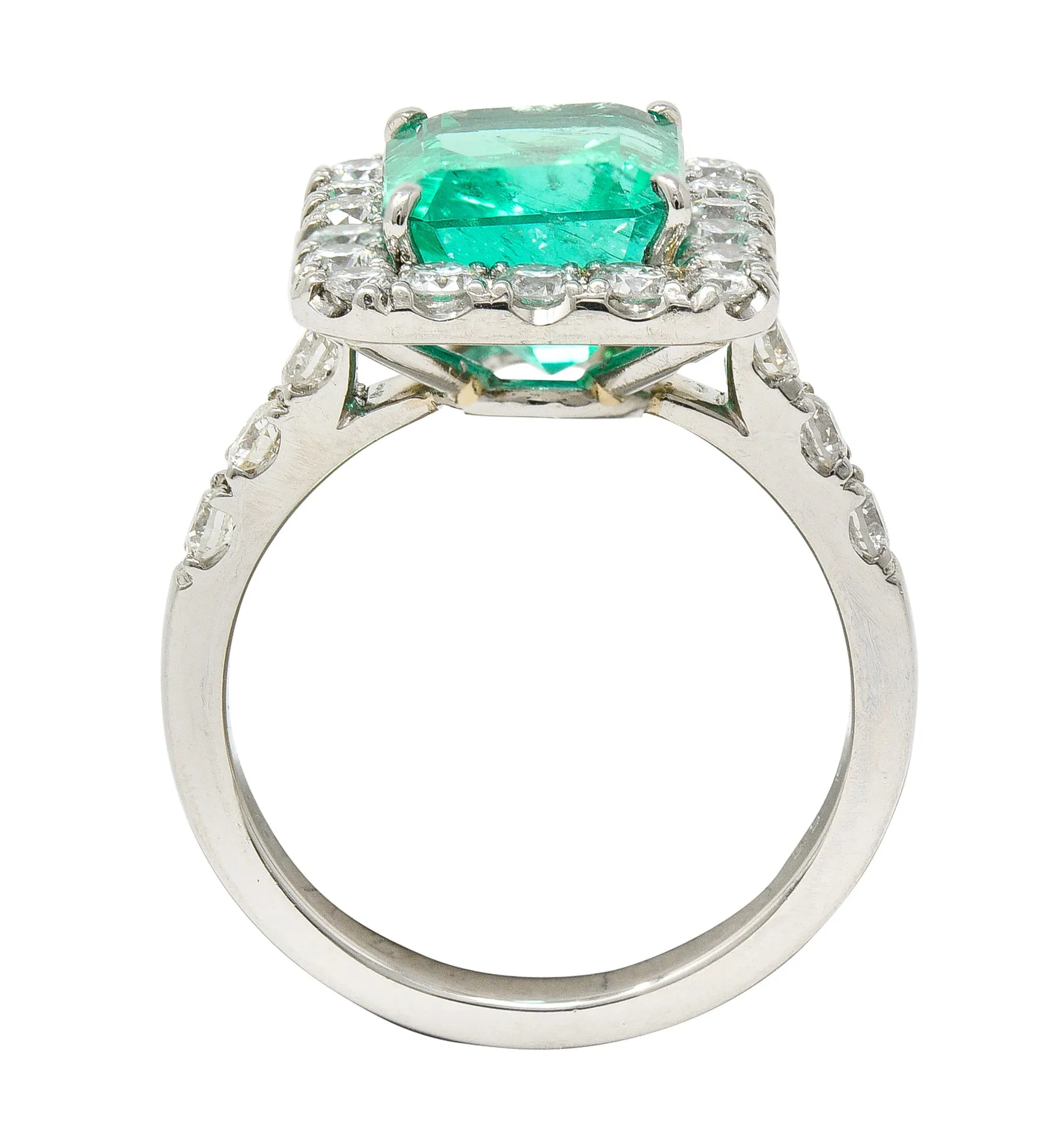 Contemporary 3.50 CTW Colombian Emerald Diamond Platinum Halo Ring GIA