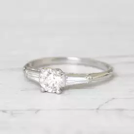 Vintage 0.65 Carat Brilliant Cut and Tapered Baguette Cut Diamond Solitaire