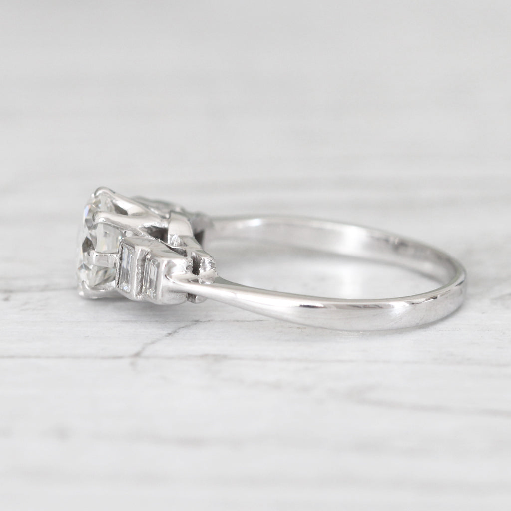 Vintage 1.23 Carat Brilliant Cut Diamond Solitaire with Baguette Diamond Shoulders